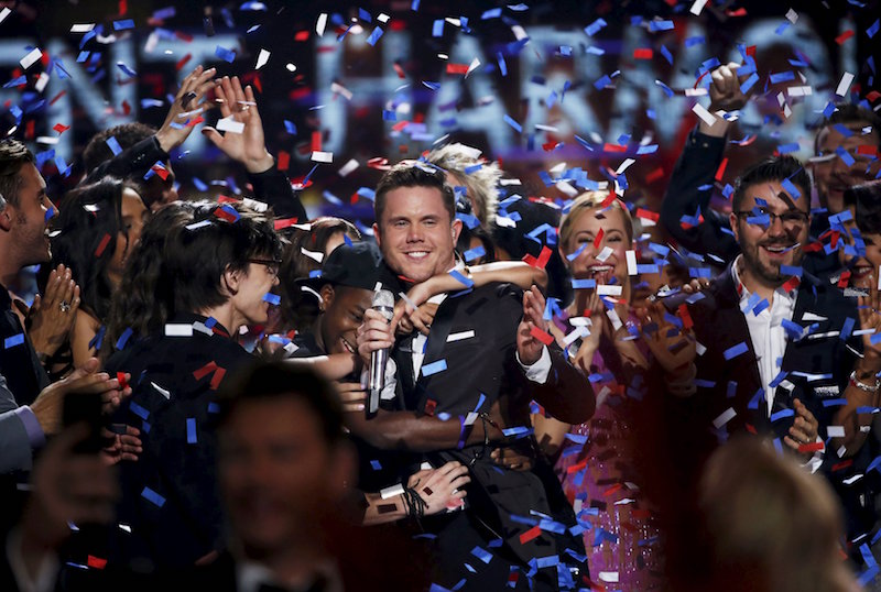 Singer Trent Harmon is congratulated after winning the competition during the American Idol Grand Finale in Hollywood April 7, 2016. — Reuters pic