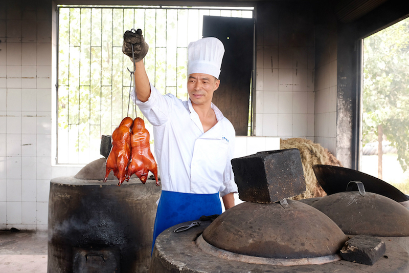 Try the delicious roast duck in Yiliang, based on Beijing’s famous method for roasting ducks. — Picture by Georgia Freedman/Zester Daily via Reuters