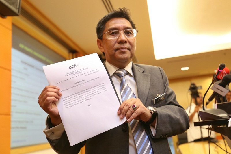 Department of Civil Aviation (DCA) director general Datuk Azharudin Abdul Rahman speaks at a press conference to announch the revision of fees and charges by the DCA, in Putrajaya April 11, 2016. u00e2u20acu201d Picture by Saw Siow Feng