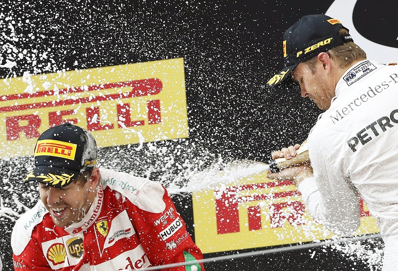 Mercedes Formula One driver Nico Rosberg of Germany (right) and Ferrari Formula One driver Sebastian Vettel of Germany after the Chinese Grand Prix, in Shanghai April 17, 2016. u00e2u20acu201d Reuters pic