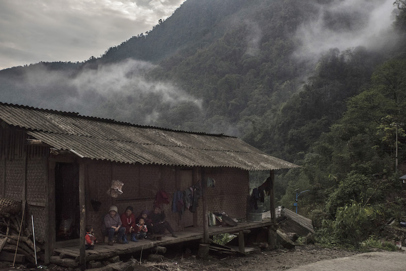 An ethnic Dulong family in Qinlandang, a village near the border of Myanmar, in China, April 2, 2016. — Picture by Gilles Sabrie/The New York Times