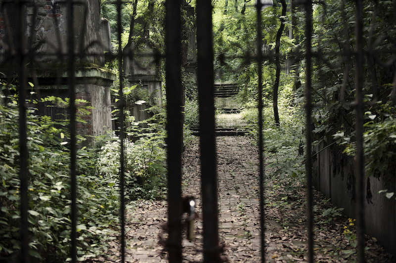 The closed gates of a Cultural Revolution cemetery in Chongqing June. 1, 2011. u00e2u20acu201d Picture by Gilles Sabrie/The New York Timesn