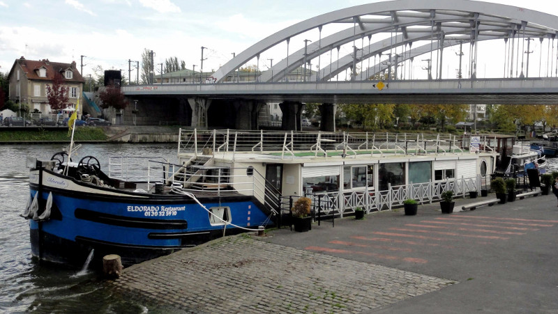 The Eldorado, a river boat restaurant on the River Oise, a tributary of the Seine, in France. — Picture by Omer Zeggane/The New York Times