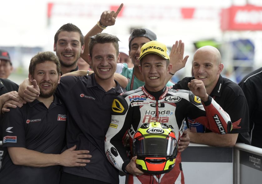 Malaysian biker Khairul Idham Pawi, of Honda, celebrates with members of his team after winning the Moto3 race of the Argentina Grand Prix at Termas de Rio Hondo circuit, in Santiago del Estero, Argentina April 3, 2016. u00e2u20acu201d AFP pic