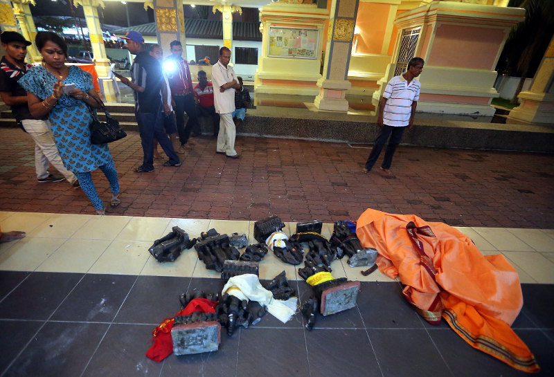 Some of the desecrated Hindu idols are seen at the Sri Muniswaran Aman Temple along Jalan Hospital Ipoh. u00e2u20acu201d Picture by Farhan Najib Yusoff