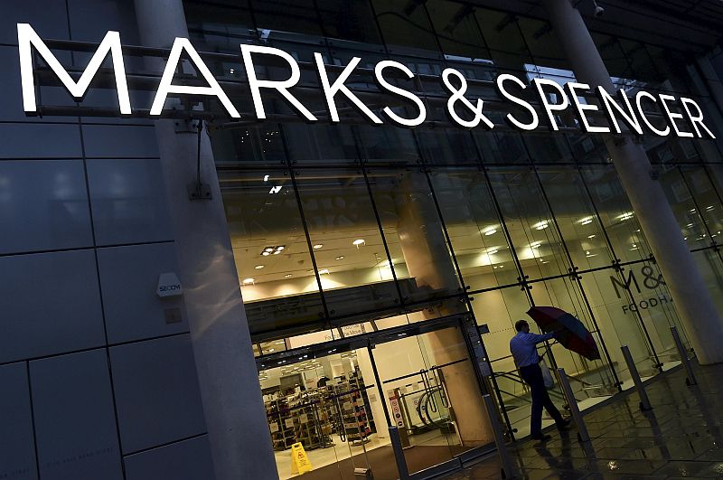 A man leaves a Marks & Spencer store in London, Britain in this January 7, 2016 file photo. u00e2u20acu201d Reuters pic