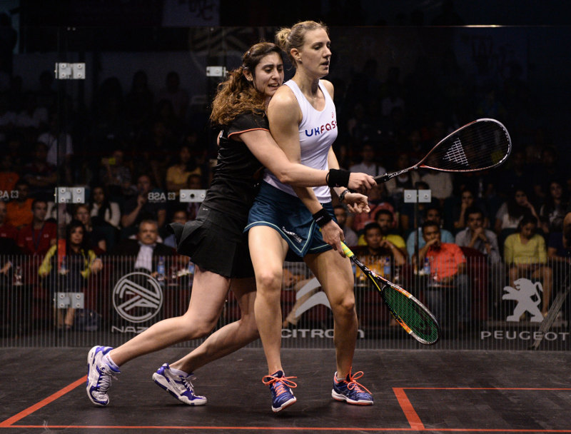 Nour El Sherbini of Egypt (left) collides with Laura Massaro of England (right) during their final match of the PSA Womenu00e2u20acu2122s World Championships squash tournament in Bukit Jalil, April 30, 2016. u00e2u20acu201d AFP pic