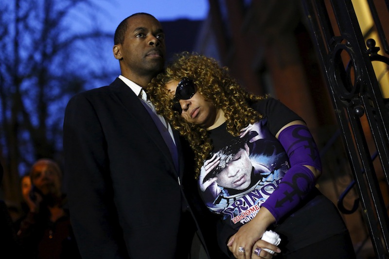 Prince fans Michael Scotland and Eudora Tucker stand at a street party hosted by director Spike Lee in the Brooklyn borough of New York, April 21, 2016. u00e2u20acu201d Reuters pic