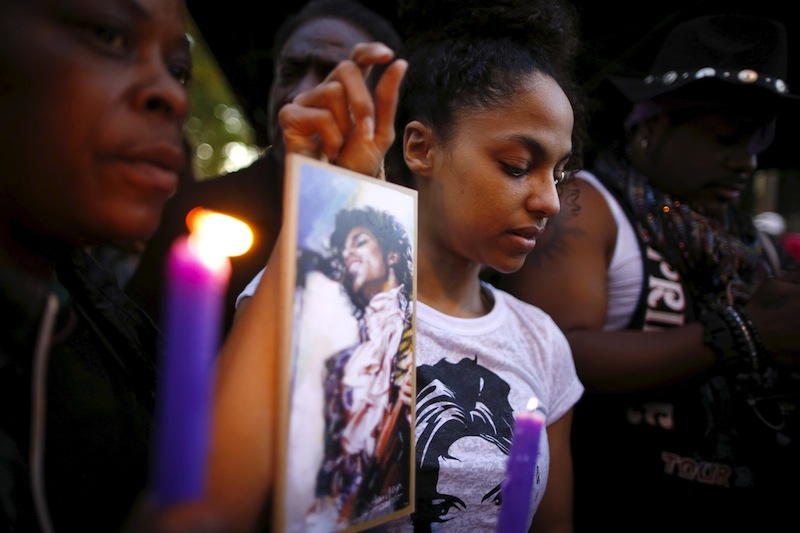 A makeshift memorial is seen as fans gather at Harlem's Apollo Theater to celebrate the life of deceased musician Prince in the Manhattan borough of New York, U.S., April 21, 2016. u00e2u20acu201d Reuters pic