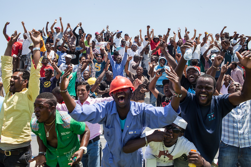 Fans of Gulf Contracting cheer during the Workers Cup, an employees’ football league in Doha April 22, 2016. — Picture by Olya Morvan/The New York Times