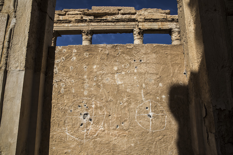 A wall used for target practice by Islamic State fighters at the grand Roman amphitheatre in Palmyra, Syria, April 2, 2016. — Picture by Bryan Denton/The New York Times