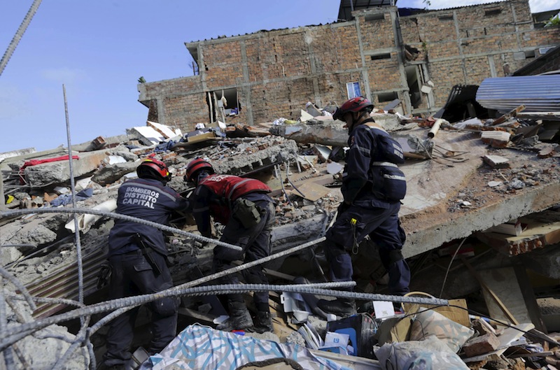 Rescue team members and firefighters search for victims at a collapsed building after an earthquake struck off the Pacific coast, in Portoviejo, Ecuador, April 18, 2016. u00e2u20acu201d Reuters pic