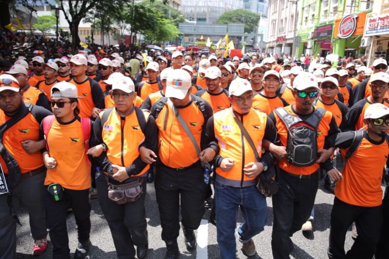 People gather at the Sogo shopping complex in Kuala Lumpur in preparation for an anti-GST rally, April 2, 2016. u00e2u20acu2022 Picture by Choo Choy May