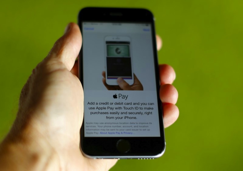 An Apple iphone 6 with Apple Pay is shown in this photo illustration in Encinitas , California June 3, 2015. u00e2u20acu201d Reuters pic