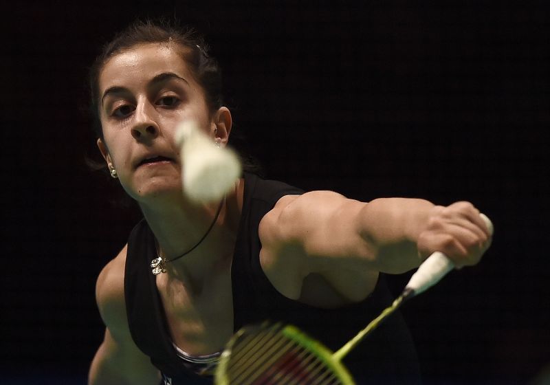 Carolina Marin of Spain hits a return against Chinau00e2u20acu2122s Wang, qurater-final 2016 Malaysia Open Badminton Superseries, Malawati stadium, Shah Alam, April 8, 2016. MANAN VATSYAYANA / AFP