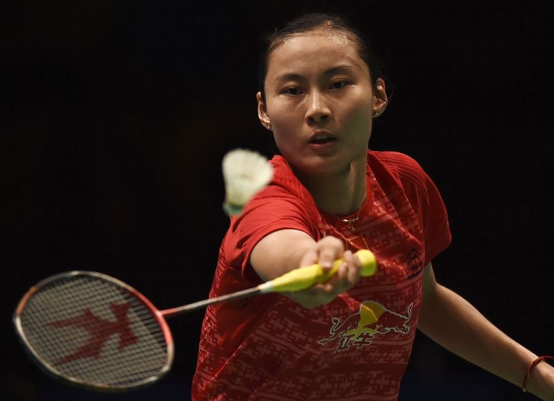 Chinau00e2u20acu2122s Wang Yihan hits a return against Carolina Marin of Spain, qurater-final 2016 Malaysia Open Badminton Superseries, Malawati stadium, Shah Alam, April 8, 2016. MANAN VATSYAYANA / AFP