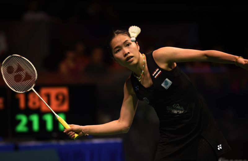 Ratchanok Intanon of Thailand hits a return against Sun Yu of China during the womenu00e2u20acu2122s singles final at the Singapore Open badminton tournament in Singapore on April 17, 2016. MOHD FYROL / AFP