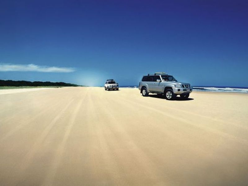 Take a 4WD drive on Fraser Island's 75 Mile Beach.