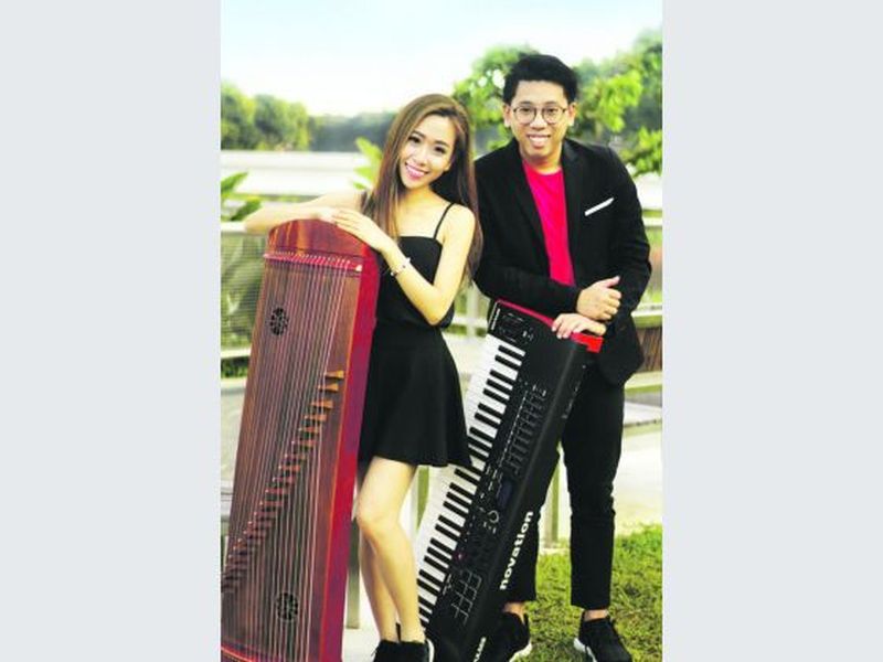 Sophy Tan Su-Hui, 25, and Dayn Ng Chee Yao, 27, comprise the music group MUSA, which has its own take on traditional Chinese music and instruments. — Picture courtesy of MUSA