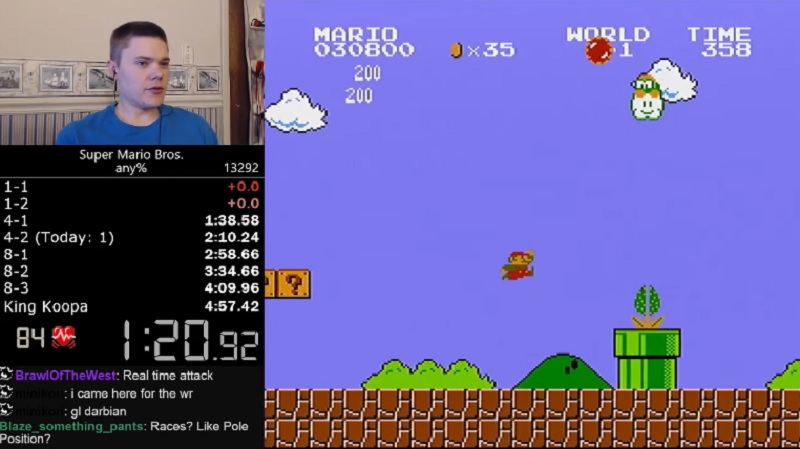 Gamer Darbian (top left corner) in the process of speedrunning through Nintendo’s Super Mario Bros as he is cheered on by fans and onlookers in the live chat (bottom left corner). — Picture via YouTube/Darbian