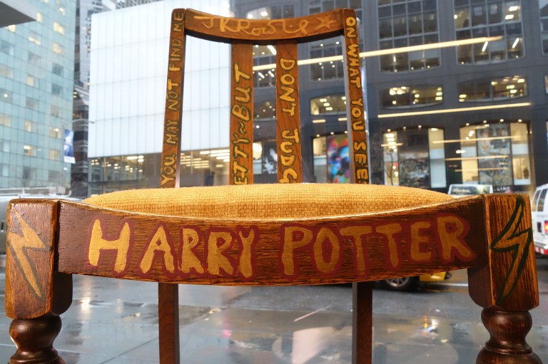 A chair used, and later decorated, by author JK Rowling while she wrote the first two u00e2u20acu02dcHarry Potteru00e2u20acu2122 books on display alongside a letter of provenance from the author at Heritage Auctions in New York April 4, 2016. u00e2u20acu201d AFP picn