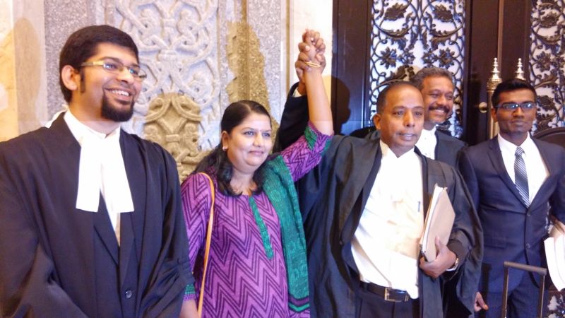 M.Indira Gandhi (second left) is all smiles after the Federal Court ruling today which ordered IGP Tan Sri Khalid Abu Bakar to locate and arrest her Muslim convert ex-husband Mohd Riduan Abdullah for contempt of court. u00e2u20acu2022 Picture by Yiswaree Palansamy