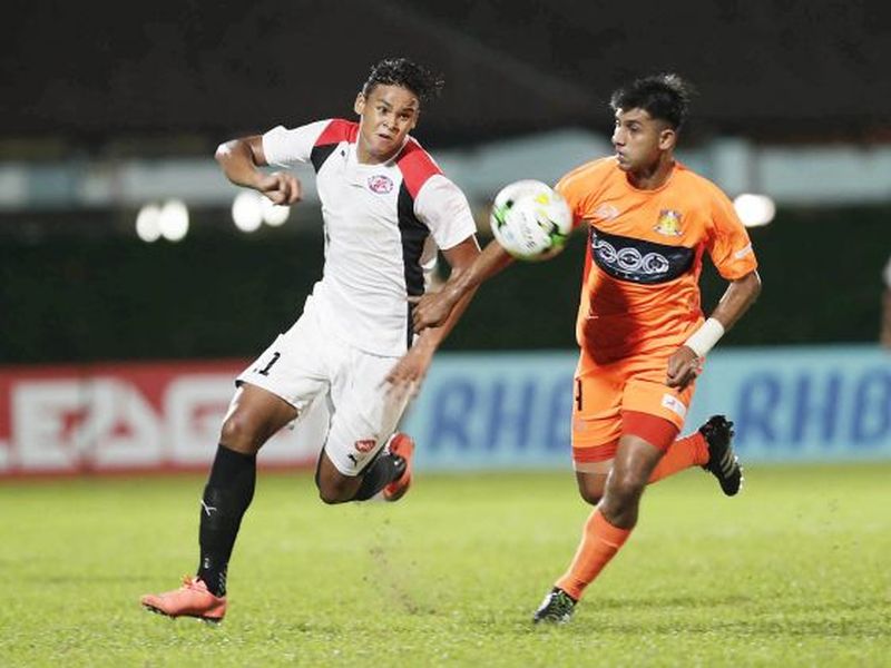 Despite his goal-poaching talent, Irfan Fandi (left) says he is comfortable playing at the back. u00e2u20acu2022 Picture by Wee Teck Hian/TODAY