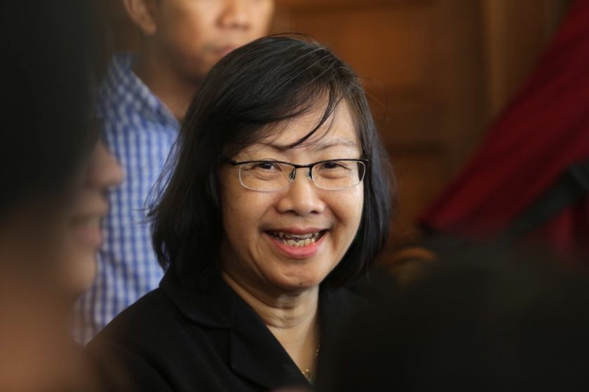 Maria Chin Abdullah is seen outside the Kuala Lumpur Courts Complex after her challenge to strike out an illegal assembly charge today. u00e2u20acu201d Picture by Choo Choy Mayn