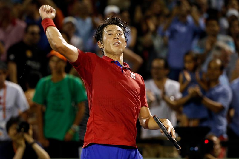 Kei Nishikori celebrates after match point against Nick Kyrgios (not pictured) in a men's singles semifinal on of the Miami Open April 1, 2016. u00e2u20acu201d USA TODAY Sports/Reuters pic