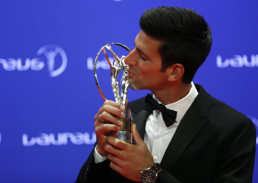 Tennis player Novak Djokovic of Serbia kisses his Laureus World Sportsman of the Year award during the Laureus World Sports Awards 2016 in Berlin, Germany April 19, 2016. u00e2u20acu201d Reuters pic