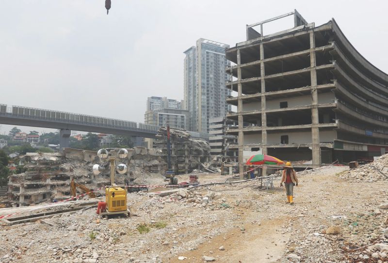 The demolition of the nine office blocks started in the third quarter of 2014. u00e2u20acu201d Picture by Zuraneeza Zulkifli