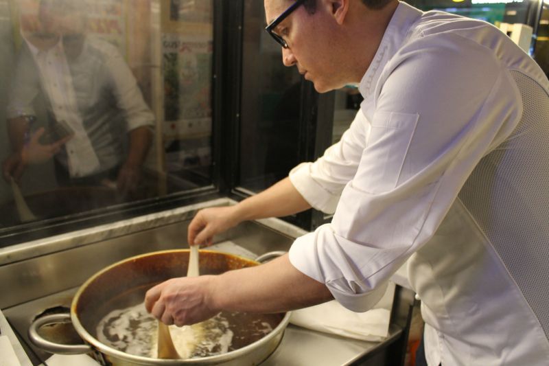 Gino Sorbillo fries pizza fritta at his Naples restaurant. — Picture courtesy of Francine Segan