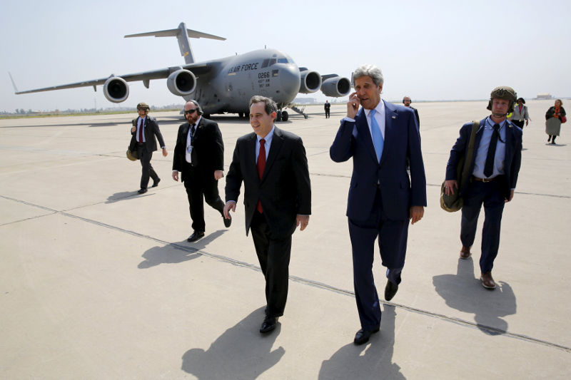 US Ambassador to Iraq Stuart Jones (centre left) walks with Secretary of State John Kerry (centre right) as he arrives via military transport at Baghdad International Airport in Baghdad April 8, 2016. u00e2u20acu201d Reuters pic