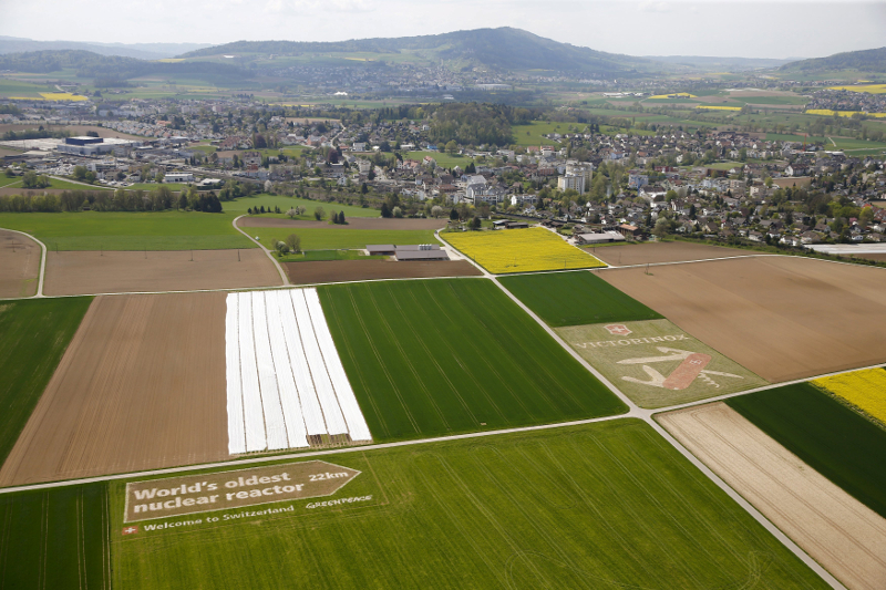 A giant signpost showing the distance to the Swiss nuclear power plant Beznau, the oldest operating in the world, placed by environmental protest group Greenpeace on a field on the approach to Zurich airport Switzerland, April 22, 2016. u00e2u20acu201d Reuters pic