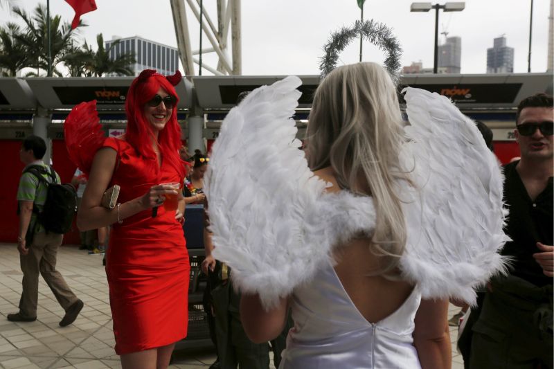 Fans dressed as angels at the stadium.