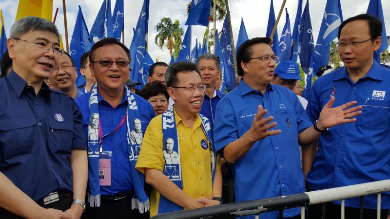 Sarawak United People's Party president Datuk Dr Sim Kui Hian (in yellow) accompanies Barisan Leaders to the nomination at Padawan Municipal Council building on April 25, 2016. u00e2u20acu2022 Picture by Sulok Tawie