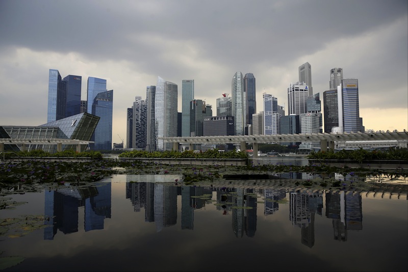 A view of storm clouds gathering over the skyline of the central business district in Singapore, April 21, 2016. u00e2u20acu201d Reuters pic