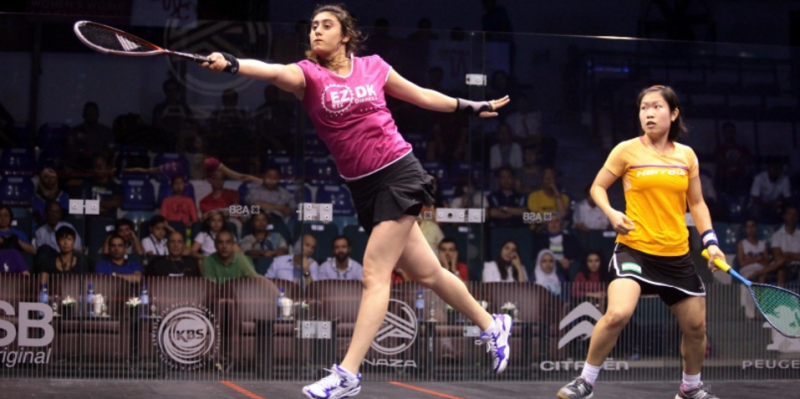 Nour El Sherbini (left), extended but comfortable in her win over Annie Au.