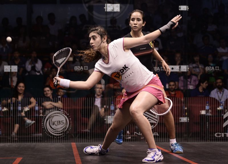 Sherbini (left) has it easy against her 18-year-old compatriot Gohar. 