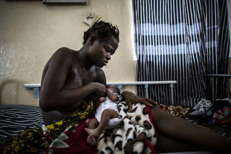 Isatu Korom, 15-years-old breastfeeds her newborn at a ward of the Princess Christian Maternity Hospital in Freetown on April 25, 2016. u00e2u20acu2022 AFP pic