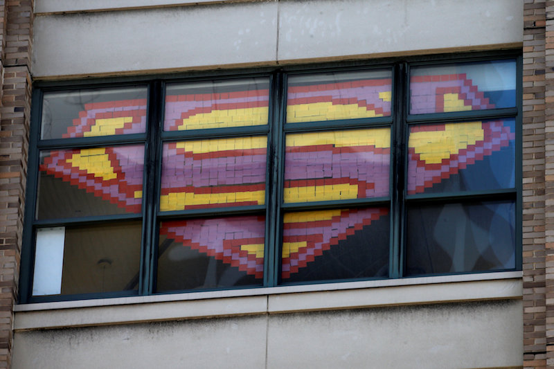 An image of the Superman Logo created with Post-it notes is seen in windows at 200 Hudson street in lower Manhattan, New York, May 18, 2016. u00e2u20acu201d Reuters pic