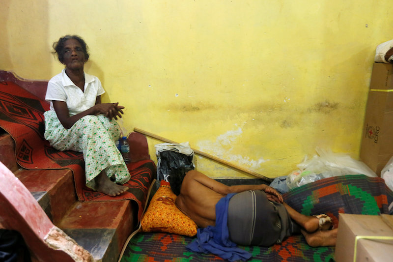 People rest inside a Buddhist temple after a landslide at Elangipitiya village in Aranayaka, Sri Lanka, May 19, 2016. u00e2u20acu201d Reuters pic
