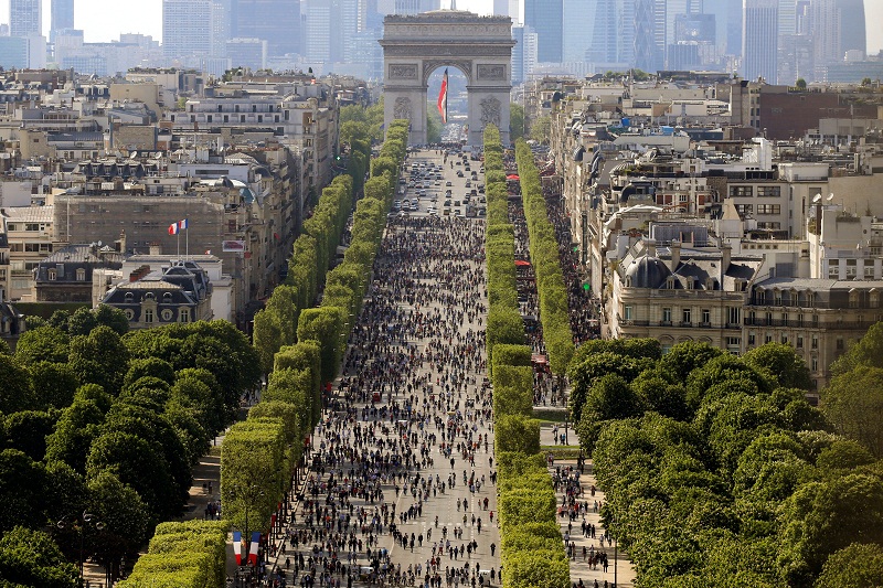 People walk on the car-free Champs-Elysees avenue in Paris, France, May 8, 2016. — Reuters pic
