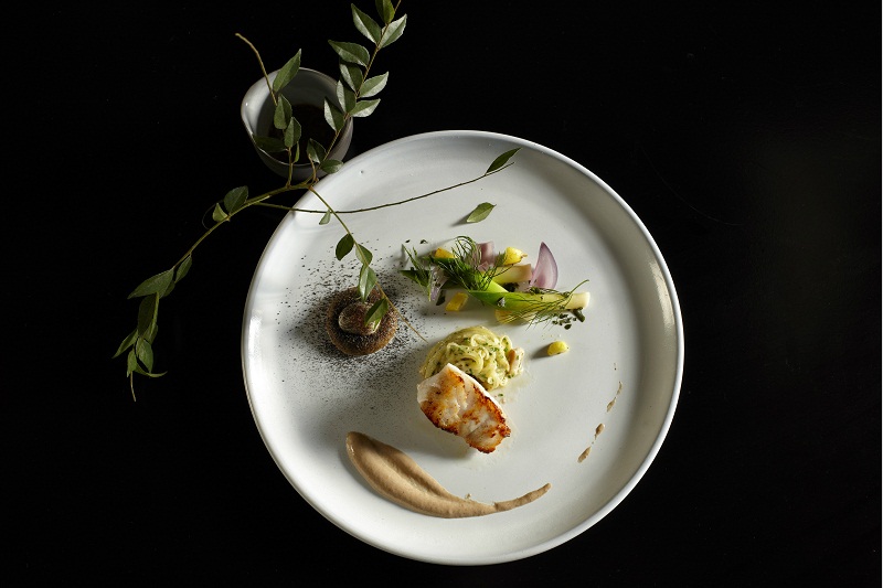 The Test Kitchen’s pan-seared linefish with potato and snoek medley, black forest ham and fish jus roasted potato skin. — Picture courtesy of The Test Kitchen