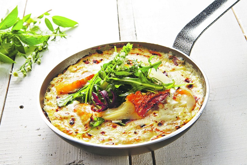OFC's coal-baked omelette with smoked haddock in a grain mustard Mornay sauce. u00e2u20acu201d TODAY pic
