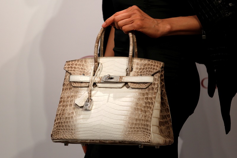 A model carries a Hermes signature Birkin with Himalayan crocodile leather and diamonds at a preview in Hong Kong, May 4, 2016. u00e2u20acu201d Reuters pic