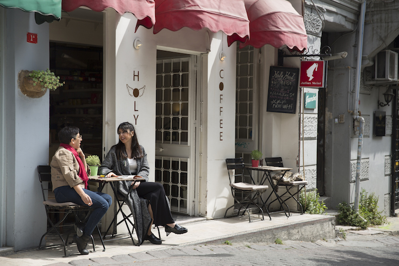 Patrons sit outside Holy Coffee, a cafe in the Cukurcuma neighborhood of Istanbul April 29, 2016. u00e2u20acu201d Picture by Jodi Hilton/The New York Times