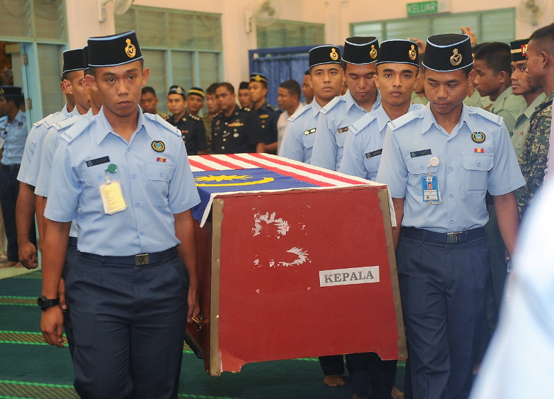 The remains of the late Datuk Noriah Kasnon being carried into the Kuching Air Force Base mosque for prayers, May 6, 2016. u00e2u20acu201d Bernama pic