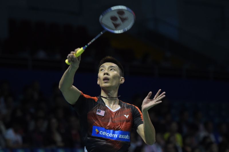 Lee Chong Wei of Malaysia hits a return to Kai Schaefer of Germany, menu00e2u20acu2122s singles group match, Thomas Cup badminton tournament, Kunshan, eastern Chinau00e2u20acu2122s Jiangsu Province May 16, 2016.JOHANNES EISELE / AFP