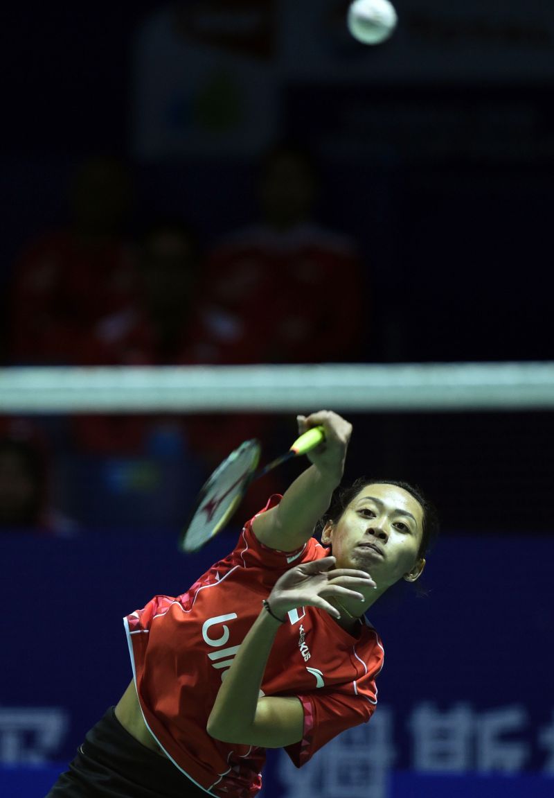 Maria Febe Kusumastut of Indonesia drops the first point against Yip Pui Yin of Hong Kong, losing 19-21, 21-12, 18-21.